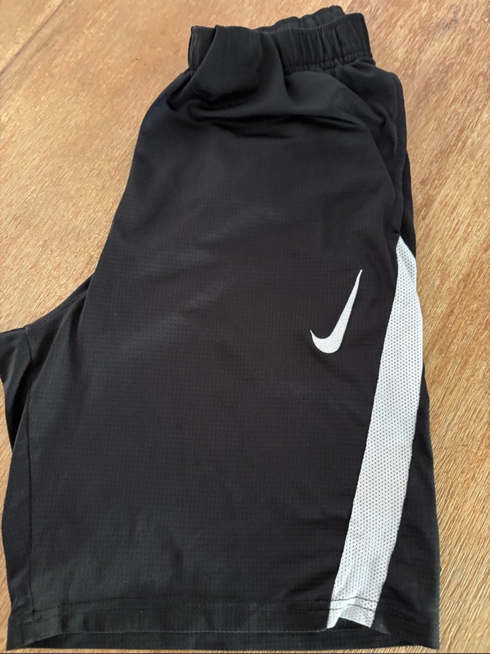 Nike Black Shorts with White Swoosh and Side Panel